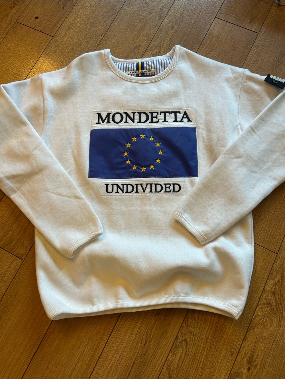 Mondetta White Crewneck with Blue Flag and Yellow Stars Graphic